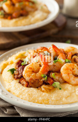 Homemade Shrimp and Grits with Pork and Cheddar Stock Photo