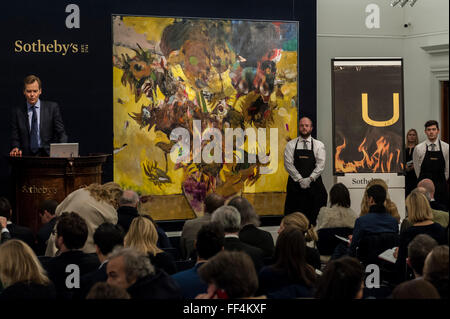 London, UK.  10 February 2016. (L to R) Adrian Ghenie's 'The Sunflowers' and Wade Guyton's 'Untitled', which sold for a hammer price of £2.65m and £1.1m respectively, at Sotheby's Contemporary Art evening sale in New Bond Street.   Credit:  Stephen Chung / Alamy Live News Stock Photo