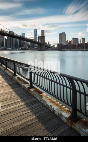 Looking towards Lower Manhattan and Brooklyn Bridge across The East River from Brooklyn, New York City, New York, USA Stock Photo