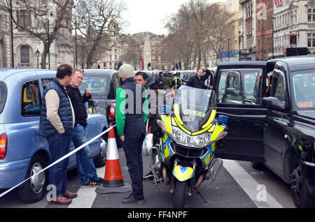 London, UK, 10 February 2016, Approximately 8000 cabs blocked the road from Trafalgar Square, Whitehall and Westminster Bridge as a protest against the app Uber and TFL issuing mini-cab licences. Credit:  JOHNNY ARMSTEAD/Alamy Live News Stock Photo