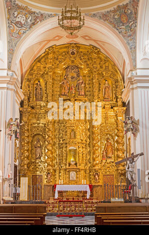 CORDOBA, SPAIN - MAY 26, 2015: The carved main altar in church of St. Ann and st.Joseph Monastery's, by Sanchez de Rueda (1710). Stock Photo