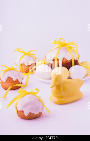 Decorated easter cakes and eggs  in yellow colors. Selective focus. Stock Photo