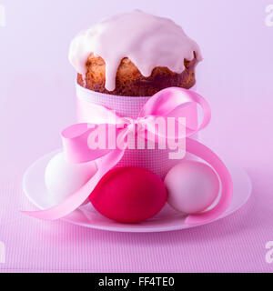 Decorated easter cakes and eggs  in pink pastel colours. Selective focus. Stock Photo