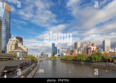 MELBOURNE - JAN 31 2016: view of Southbank footbridge and Yarra river from Princes bridge with office buildings in the backgroun Stock Photo