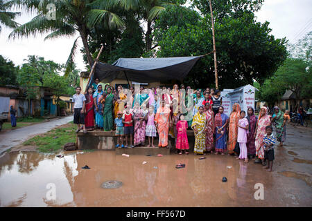 Families from the Nehru Palli slum in Cuttack get legal advice and birth certificates from a Legal Aid Clinic run by the organisation CLAP. Committee for Legal Aid to Poor (CLAP), helps provide legal aid to the poorer communities in the Orissa district of India. Stock Photo