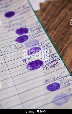 The finger prints of people registering for birth certificates from a rural slum in the Orissa district of India gets legal advice and birth certificates from a Legal Aid Clinic run by the organisation CLAP. Committee for Legal Aid to Poor (CLAP) is a non-profit organisation helping to provide legal aid to the poorer communities in the Orissa district of India. Stock Photo