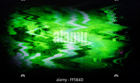Green interlaced tv screen static noise, vignette abstraction background backdrop Stock Photo