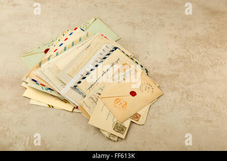 Old envelopes and letters stacked in a bundle Stock Photo