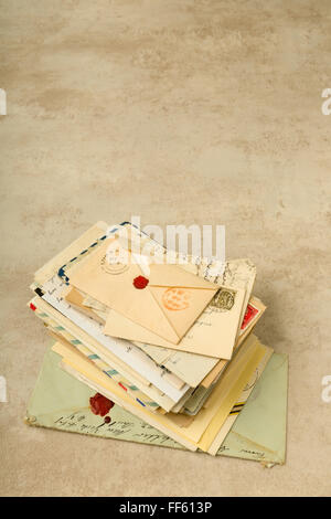 Old envelopes and letters stacked in a bundle Stock Photo
