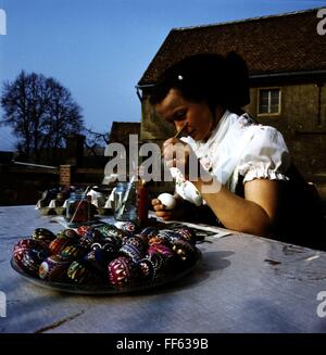tradition / folklore, Easter, young woman decorating Easter eggs using paint and wax, painting, Sorbian custom, customs, Sorbs, egg, decoration, coloured, craft, handcraft, craftwork, festivity, festivities, Germany, Upper Lusatia, historic, historical, 20th century, people, women, female, Additional-Rights-Clearences-Not Available Stock Photo