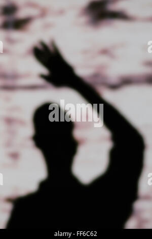 Shadow of a man’s arm and hand waving Stock Photo - Alamy