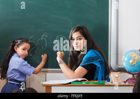 30 30s Adult Womans Asia Asian Asians Black Boards Casual Attire Casual Clothes Classroom Scene Classroom Scenes Colours Image Stock Photo