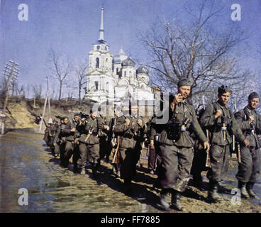 events, Second World War / WWII, Russia 1942 / 1943, German infantry on the march in the Ukraine, circa 1942, infantrymen, marching, mud period, Wehrmacht, soldiers, uniform, uniforms, equipment, Soviet Union, USSR, 20th century, historic, historical, Eastern Front, church, people, 1940s, Additional-Rights-Clearences-Not Available Stock Photo
