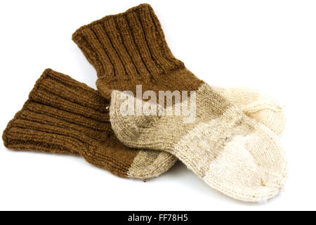 Traditional hand-knit wool socks in three colors Stock Photo