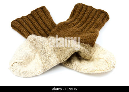 Traditional hand-knit wool socks in three colors Stock Photo