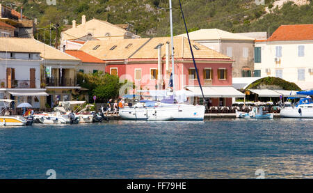 Gaios, Paxos, Ionian Islands, Greece. View across the harbour to colourful waterfront buildings. Stock Photo