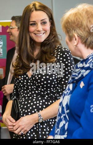 Her Royal Highness The Duchess of Cambridge chatting to parents and staff at Brookhill Children’s Centre.  A Home-Start project that offers support to children and families. London, UK.