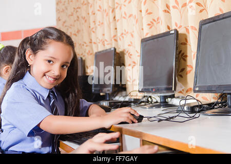 Asia Asian Asians Close Up Closeup Computer Labs Computers Labs Desktops Electronics Examinations Head and Shoulders Holding Stock Photo