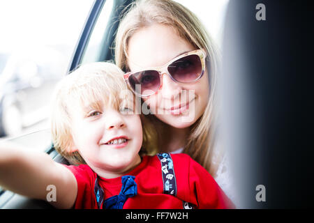 Portrain of mother and son in the car Stock Photo