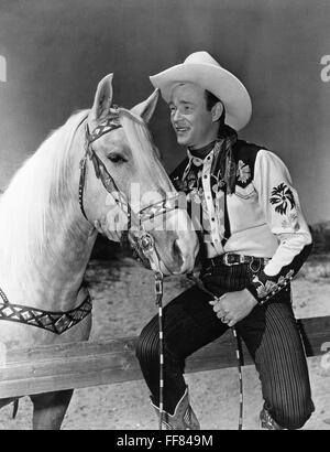 ROY ROGERS singing cowboy actor with his horse Trigger Stock Photo - Alamy