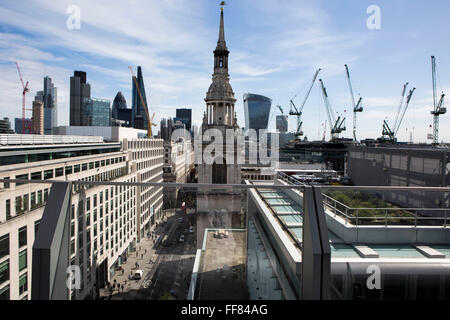 The spire of St Mary-le-Bow from the roof of One New Change, London UK.  A historic church rebuilt after the Great Fire of 1666 by Sir Christopher Wren in the City of London. Stock Photo