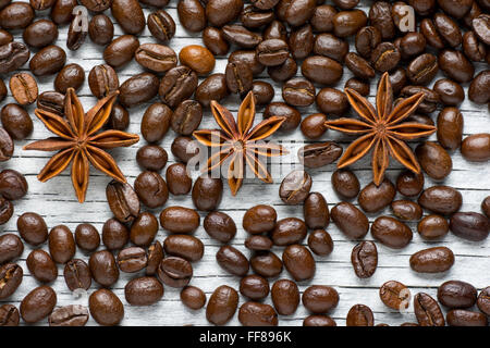 Coffee beans, cinnamon and star anise on white background Stock Photo