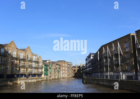 Lime Kiln Dock in Tower Hamlets East London Docklands Creek House Dunbar Wharf Dundee Wharf Sail Makers House  grade 2 listed Stock Photo