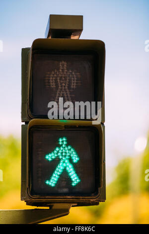 Green man go walk traffic light sign England UK Stock Photo - Alamy