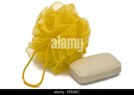 Piece of  soap and bast, isolated on white background Stock Photo