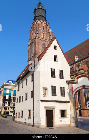 Jas house and St Elizabeth church in the old town of Wroclaw, Poland. Stock Photo