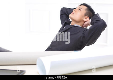 Dreams of professional success, a break in the work on the project. Stock Photo