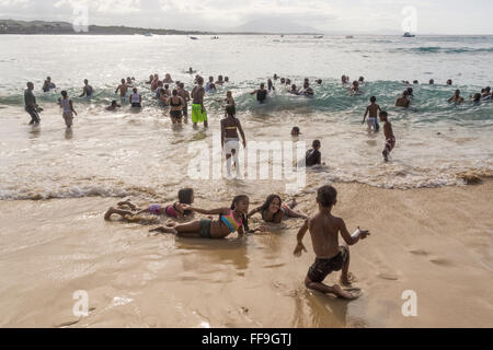 Local people at Sosua beach , kids,  Sosua, , Puaerto Plata,  Dominican Republic