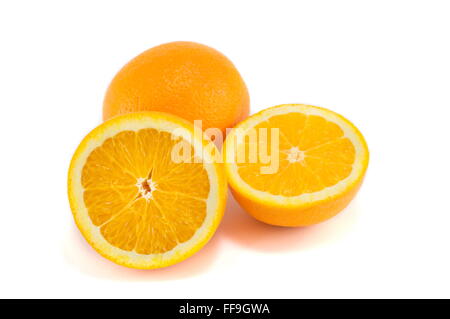 halved and whole orange isolated on white Stock Photo