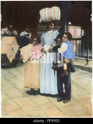 IMMIGRANTS: ELLIS ISLAND. /nAn Italian mother with her children at Ellis Island, c1910. Stock Photo