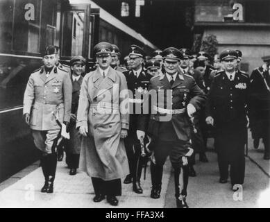 Adolf Hitler and Hermann Goering walking in a group. L-R: Martin ...