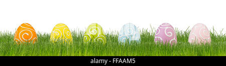 colorful decorated easter eggs on green grass Stock Photo