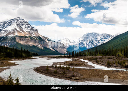 Athabasca Riversky, clouds, cloudscape,  close view with  Columbia Icefield in background in Jasper National Park, Alberta,Canada Stock Photo