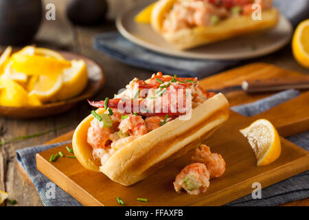 Homemade New England Lobster Roll with Lemons Stock Photo