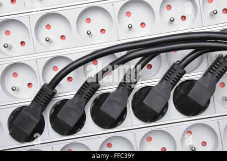 Electrical cords with power strips Stock Photo
