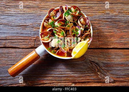 Clams tapa in ceramic pan tapas from Spain seafood Stock Photo