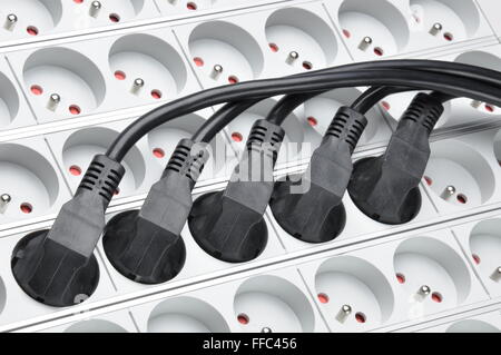 Electrical cords with power strips Stock Photo
