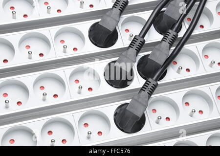 Electrical cords with power strips Stock Photo