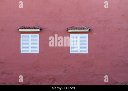 Typical canarian house wall with two windows Stock Photo