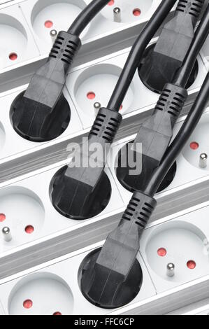 Electrical cords with power strips Stock Photo
