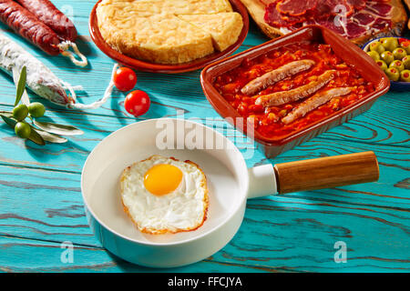 Tapas pisto con tomate ratatouille egg and sausage from Spain Stock Photo