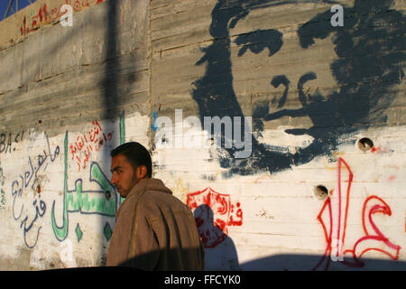 Che Guevara has been painted on the Wall. It is common image along the wall separating; Palestine and Israel. Stock Photo