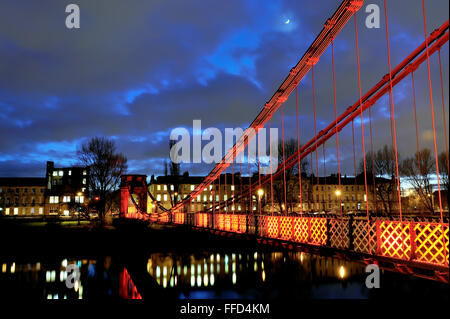 Carlton Bridge, also known as South Portland Street Suspension Bridge, in Glasgow, Scotland at dusk Stock Photo