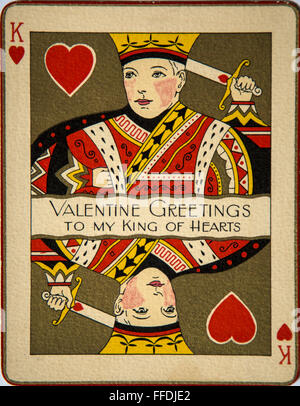 An old postcard advertising 'Valentine's Greetings To My King Of Hearts' in the shape of a playing card. Stock Photo