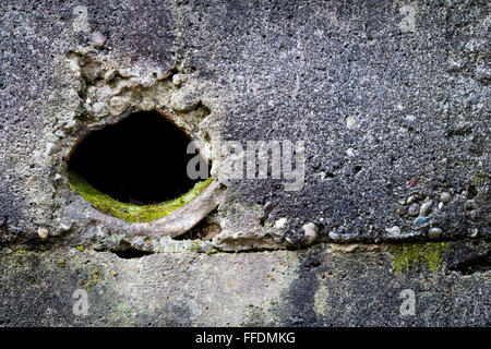 concrete wall with hole texture Stock Photo
