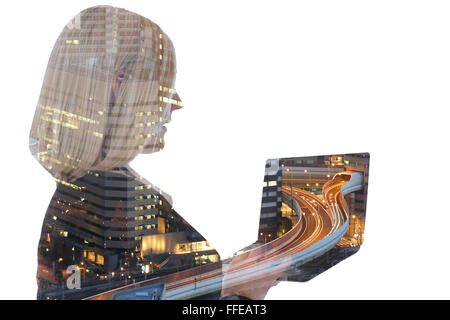 Business woman businesswoman with laptop computer internet city double exposure Stock Photo
